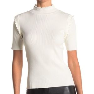 Mock-neck ruffled sweater